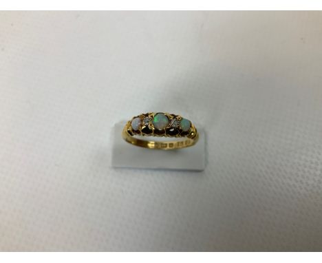 18ct Gold Opal and Diamond Ring - Size M 