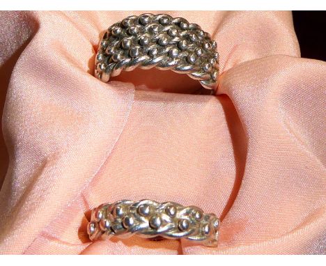 Two stamped 'silver' Keeper rings, one with two braid band, other with four braid, size 'P' and 'M 1/2'.