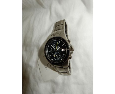 A Seiko Titanium Sportura Chronograqph 100 M in barely used condition, the clear black face with luminous white hands having 