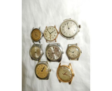 A quantity of watch movements lacking straps and including Citizen Automatic with date window, - (running at the time of lott