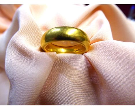 A 22ct gold Wedding band, Birmingham, date letter 'U', maker S. &amp; Co. (Sanders &amp; Co.), size 'K 1/2', 13.12gm.