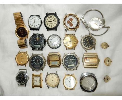 A maroon/red jewel casket containing a quantity of watches and watch movements including Swatch, Lorus, Sergio Valente, Excel