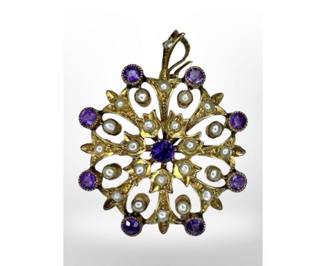 A 9ct gold amethyst and seed pearl brooch/pendant, diameter 3cm.  CONDITION REPORT: 6.6g