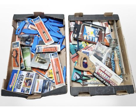 A quantity of tools, mostly in retail packaging, including handsaws, stanley knives, screwdrivers, spray gun kit. (2 boxes)
