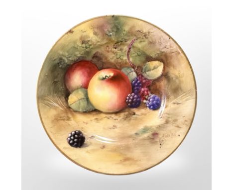 A Royal Worcester porcelain saucer hand-painted with fruit, by A G Moseley, diameter 12cm.