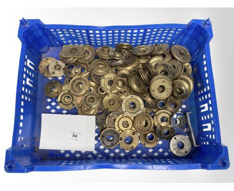 A quantity of vintage brass door collars.