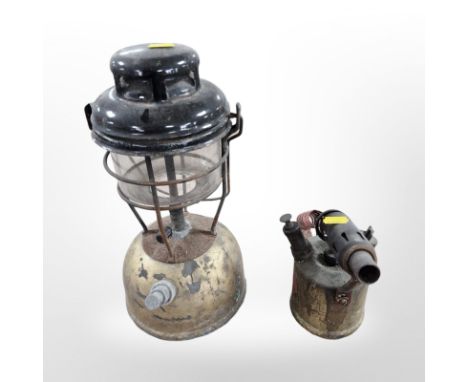 A vintage Tilley oil lamp and a Monitor blow torch.