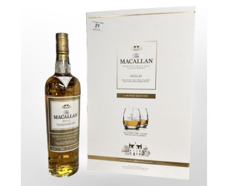 A limited edition bottle of The Macallan Gold, 700ml, in presentation case including two luxury glasses.