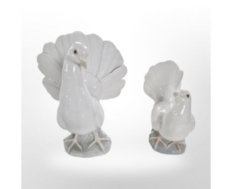 Two Lladró doves, No. 1015 and 1016, both boxed, together with a Nao dove and a Wedgwood Kutani coffee cup and saucer 
