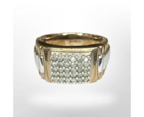 A 9ct gold 'Rolex' style diamond-set signet ring, the stated total diamond weight 0.50 carat, size U.  CONDITION REPORT: 8.9g