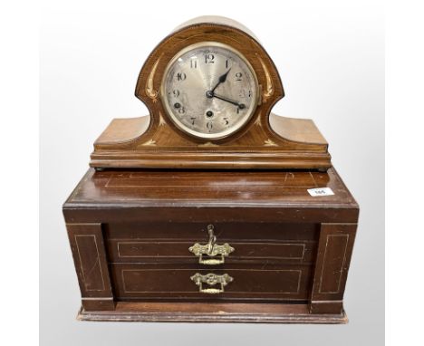 An inlaid Edwardian canteen box (empty) together with an inlaid mantle clock with pendulum 