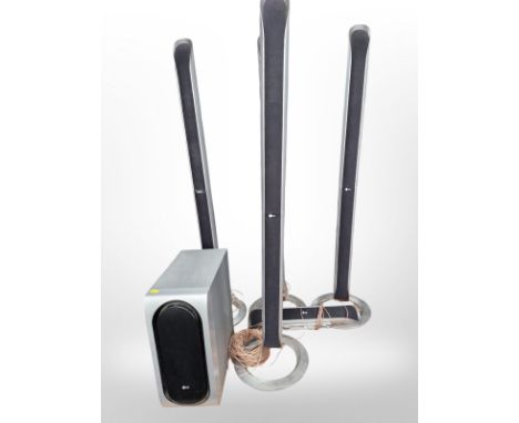 A six-piece LG surround sound speaker system.
