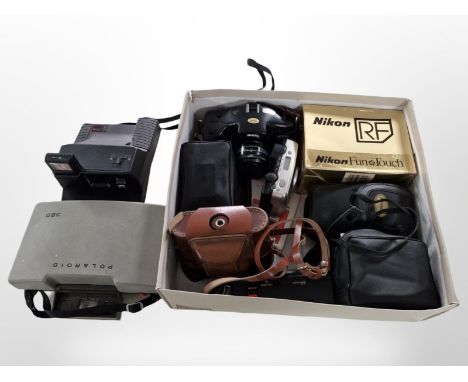 A small quantity of vintage cameras including Polaroid, Nikon, etc.