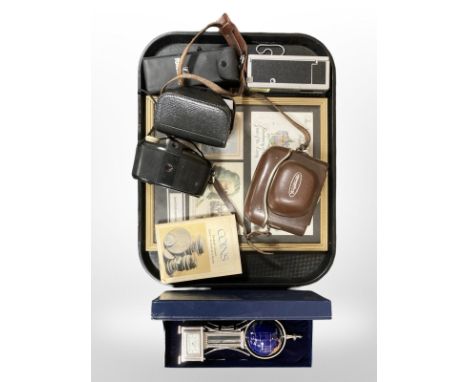 A group of vintage cameras, framed stamp montage, Quartz mantle timepiece with gemstone globe etc 
