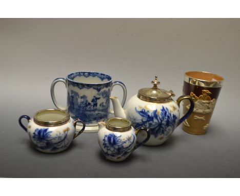 Ceramics - a Carltonware three piece tea service, decorated with a powder blue floral  design, a Doulton Watteau twin handled