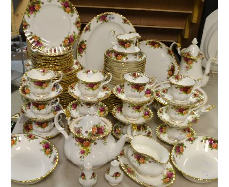 A Royal Albert Old Country Roses dinner and tea service for twelve - teapot, milk and sugar, coffee pot, sauce boat on stand,