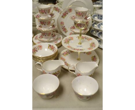 A Colclough tea service for six, comprising two tier cake plate, side plates, cups and saucers; cake plates; fruit dishes; cr