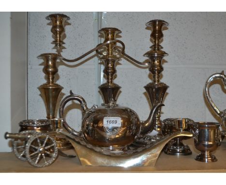 Silver plate - a three piece table garniture, central two branch candlestick and pair of singles,  a Victorian globular teapo