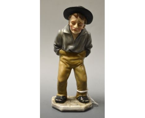 A Royal Worcester figural menu/name card holder, standing male with hand in his pockets, impressed marks 