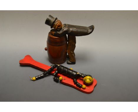 Toys & Juvenalia - a Vintage Fisher Price Toys dancing cat puppet;   a Bavarian carved black forest tobacco jar , man and bar