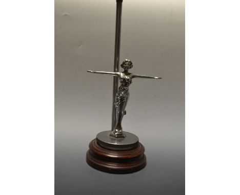An Art Deco chrome car mascot, remounted as a table lamp, Brise Printaniere, cast with a young lady, her arms out stretched, 