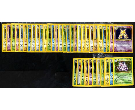 This lot contains 41 holo cards from vintage sets such as Base Set, Jungle, Fossil, Base Set 2, Team Rocket. All cards are in