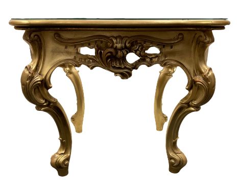 Italian Rococo style gilt square lamp table, shaped top over cartouche and foliate apron raised on scrolling cabriole support