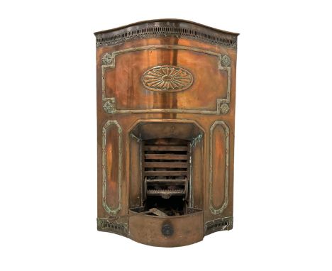 Early 20th century Adams design copper freestanding fireplace, serpentine front with pierced fretwork frieze, moulded reeded 