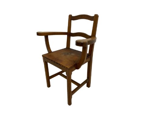 Acornman - Yorkshire oak carver elbow chair, the waived ladder back over tan hide seat with brass stud work, raised on chamfe