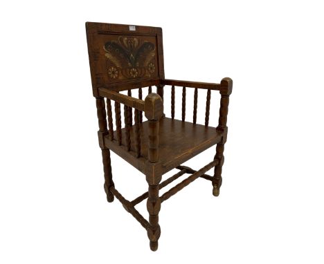 19th century scumbled pine Swedish armchair, the panelled back painted with traditional patterns over bobbin turned spindles,