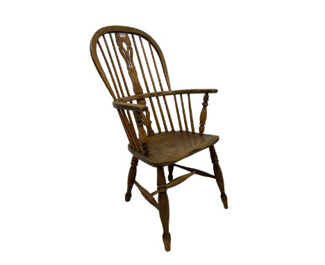 19th century elm Windsor chair, high stick back with pierced beech splat, raised on turned supports united by H-stretcherDime