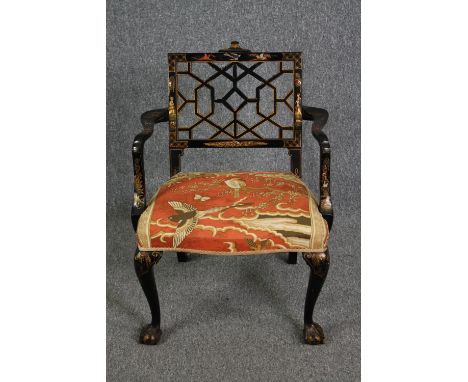A Chinese Chippendale style lacquered armchair hand decorated in gilt. H.80cm. 