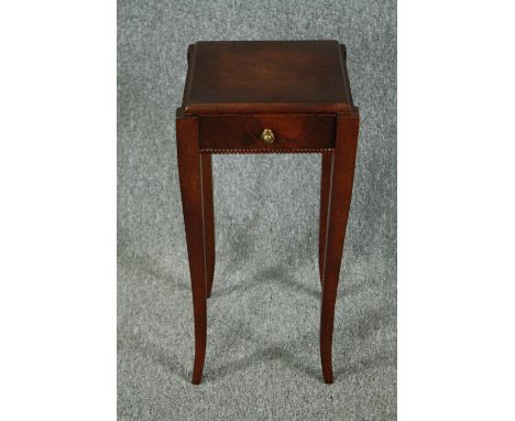 Urn stand or lamp table, early 20th century French oak on slender cabriole supports. H.64 W.33 D.31cm. 