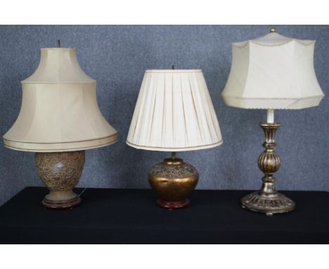 A vintage carved giltwood table lamp and two ceramic baluster form table lamps. H.93cm. (Largest). 