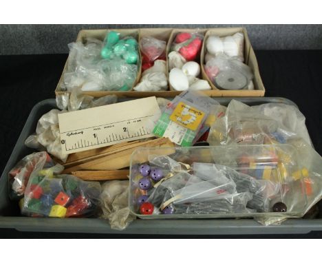 Two boxes of Gallenkamp early 20th century molecular model components, some made of painted polystyrene, some made of plastic