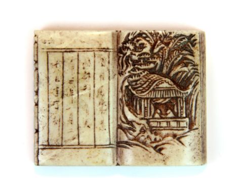 An early 20th century Chinese carved book shaped soapstone seal, 5 x 4cm.