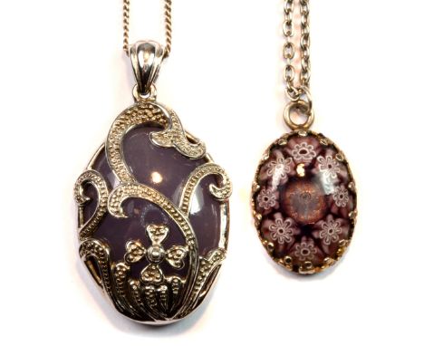 A 925 silver chalcedony set pendant and chain together with a further silver Murano glass style set pendant and chain.