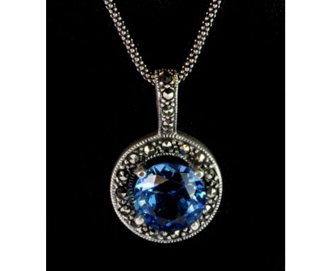 A 925 silver and marcasite stone set pendant and chain.