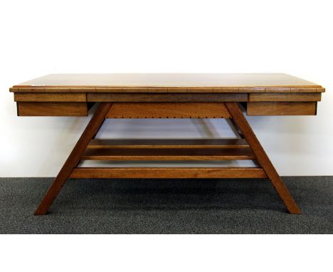 An interesting 1970's teak coffee table with end drawers, 93 x 46 x 40cm.