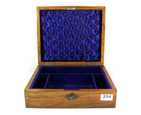 A 1920's olive wood veneered and silk lined sewing box, 29 x 25 x 10cm.