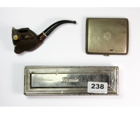 Three vintage gentleman's items, including a bull head pipe, an engine turned cigarette case and a Darwin cased safety razor.