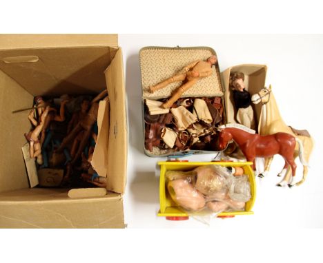 A vintage toy cowboy doll set.