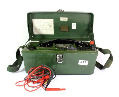 A vintage cased field telephone.
