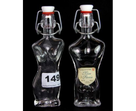 A pair of interesting vintage Marc De Savoie bottles, H. 15cm.