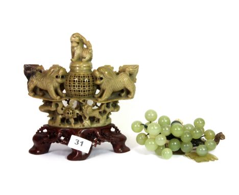 A mid 20th century Chinese carved soapstone desk censer and cover (H. 21cm) together with a bunch of jade grapes.