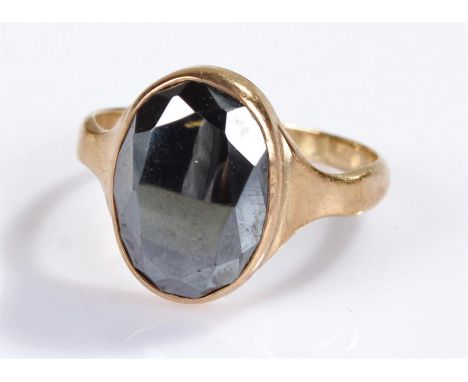 9 carat gold ring, with a faceted cut stone, ring size R