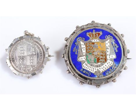 Coin brooch, housing a Victoria Shilling, together with an enamel brooch, (2)