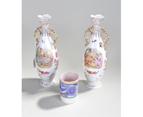 Two vases with floral and gilt design and a Poole pottery beaker. the vases 30cm tall