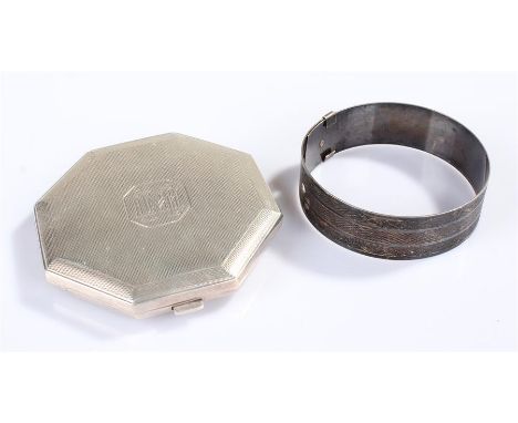 Silver compact, with engine turned decoration, together with a silver bracelet, (2)