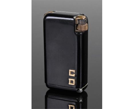 Enamel and gold Querria Flaminaire Grillo lighter. The black enamel lighter with French gold mounts, 6.6cm high 